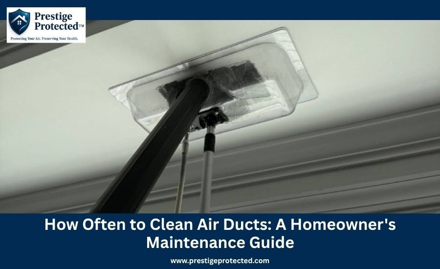 A professional air duct cleaning tool with a clear plastic seal attached to a ceiling vent to capture dust and debris.