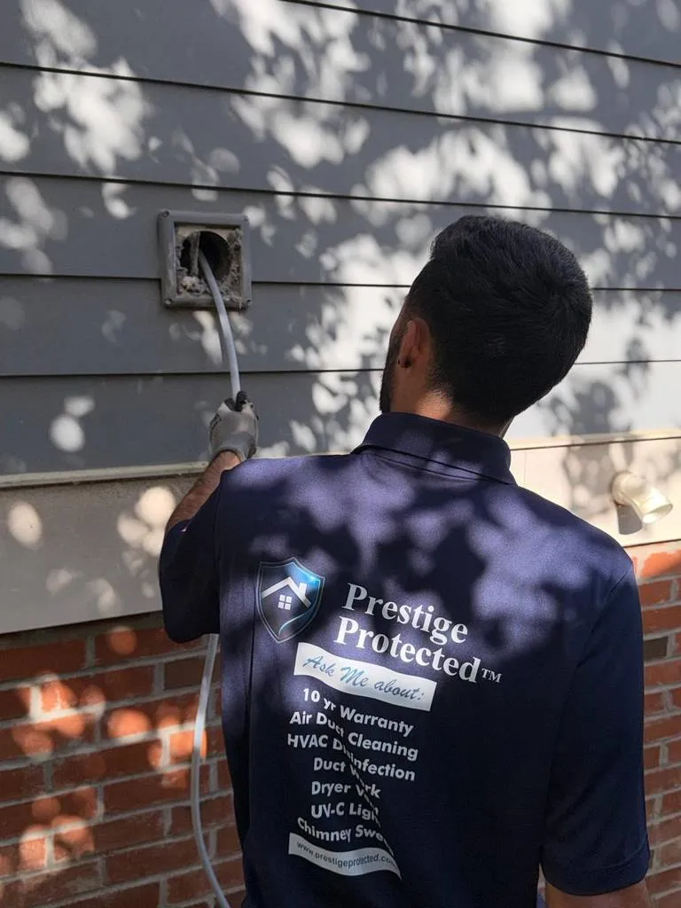 Real before-and-after dryer vent cleaning results from a Prestige Protected job in the Triangle